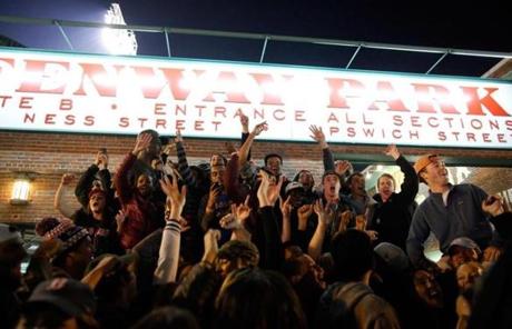 Fans celebrated outside Gate B at Fenway Park.
