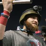 Jonny Gomes waived a championship flag after the Game 6 victory. 