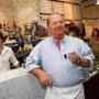 Celebrity chef Mario Batali sampled coffee during a preview tour of Eataly before its grand opening in New York City in August 2010.