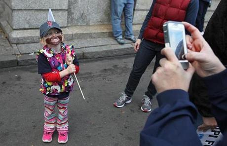 Three-year-old Megan Bettez of Gardner showed off her Red Sox spirit on Tremont Street. 
