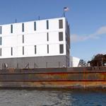An unusual structure on a barge in Portland Harbor has had people buzzing.