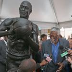Boston Celtics Hall-of-Famer Bill Russell was surrounded by former teammates and others Friday as his statue was unveiled on City Hall Plaza.