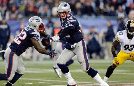 Tom Brady handed the ball off to Stevan Ridley.
