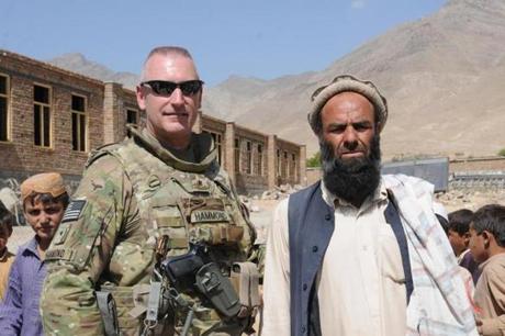 Jack Hammond, retired Army brigadier general, with a village elder in Kabul province in Afghanistan in 2011. says the Marathon bombing left him with sleepless nights.

