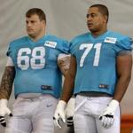 Miami Dolphins guard Richie Incognito (left) and tackle Jonathan Martin stood on the field during a practice. 