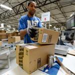 The deal gives the Postal Service a chance to take some of Amazon’s delivery business from United Parcel Service and FedEx, which do not deliver on Sundays.