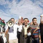 Protesters marched during a demonstration calling on militiamen to leave in Tripoli November 15, 2013. 