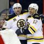 Johnny Boychuk, left, scored in the third period and was congratulated by forward Jarome Iginla.