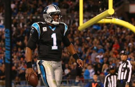 Cam Newton reacted after his touchdown pass in the first quarter.
