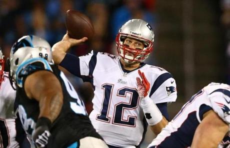 Tom Brady took aim toward a receiver.
