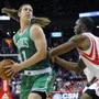 Kelly Olynyk looked to the basket with the  Rockets' Terrence Jones at his back in the first half.