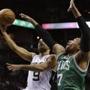 The Spurs' Tony Parker took a shot over Jared Sullinger in the first half.