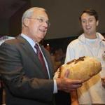 Mayor Thomas M. Menino received a gift of bread from chef Fabrice Ligouzat of Paul.
