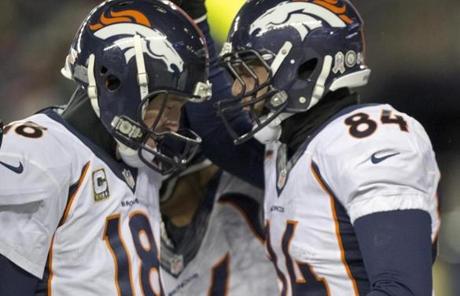 Jacob Tamme (right) celebrated his 10-yard touchdown reception with Peyton Manning in the second quarter.

