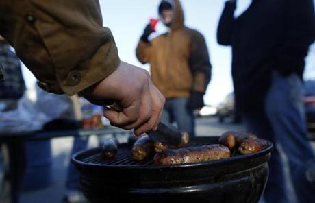 St. John's Prep fans cooked sausages in the parking lot before the start of play between St. John's Prep and Xaverian. 
