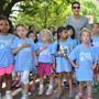 Mario Lopez stood with young runners at the start of the Run & Ride at CambridgeSide.