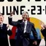 Nelson Mandela (center) visited the Kennedy Library during his 1990 visit to Boston.