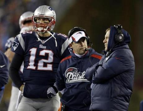 Tom Brady, Josh McDaniels and Bill Belichick, left to right, now have to move on without Rob Gronkowski.
