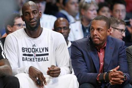 Paul Pierce (right, with Kevin Garnett) has been out since Nov. 29 with a fractured right hand.
