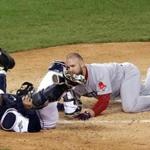 MLB seeks to ban collisions such as this one between Alex Avila and the Sox’ David Ross in the ALCS.