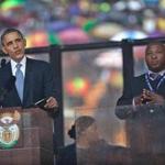 President Barrack Obama spoke while interpreter Thamsanqa Jantjie stood during Nelson Mandela’s memorial service. 