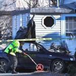 State Police investigated the scene of al crash involving a car that slammed into a house in Revere on Friday.