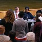 George Perry, Jeri Robinson, and John Barros led a town hall-style meeting on education at English High Tuesday.