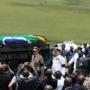 Nelson Mandela's casket was taken to its burial place in Qunu, South Africa.