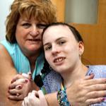 Linda Pelletier with her daughter Justina at Boston Children’s Hospital, during one of her allowed weekly visits.