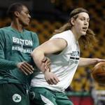 Rajon Rondo, shown guarding Kelly Olynyk during a workout before Monday’s game at the Garden, ran the floor with teammates in an impromptu scrimmage Friday.