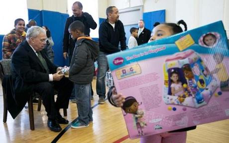 Mayor Menino talked gifts with Steven Dorosareo, 7, of Dorchester. Rhianna Dagraca, 2, of Medford is in the foreground.
