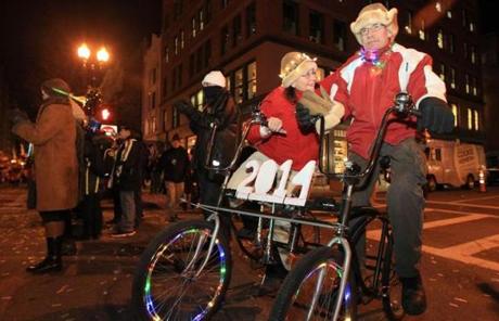 Husband and wife Rebecca Albrecht and Paul Larrabee biked from Brookline on a bicycle Paul made for the occasion.
