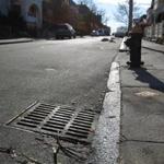 Storm drains are being stolen all over Dorchester. A replaced storm drain on Sydney Street.