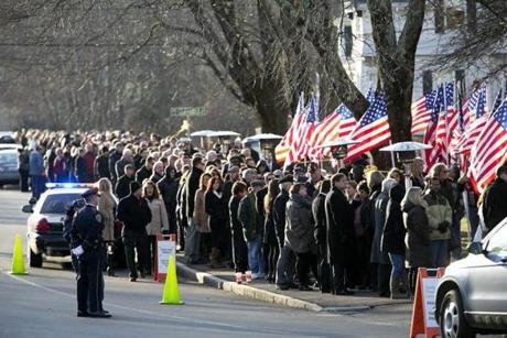 Mourners lined the block outside an Abington funeral home for Sgt. Daniel Vasselian’s wake. 
