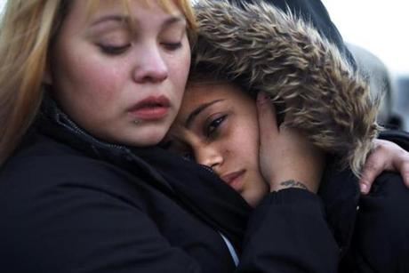 Stephanie Ruiz, left, comforted Nancy Garcia, whose mother, Aura Garcia, was crushed to death on the Andrew McArdle bridge. 
