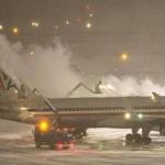 A plane was de-iced at Logan Airport on Thursday.