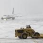 A Logan Airport official said runways were back to bare pavement by Friday afternoon.