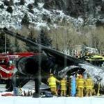 Emergency crews worked near a passenger plane that crashed upon landing at the Aspen-Pitkin County Airport in Colorado.