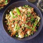 Millet, the base of diets in Africa and Asia for centuries, can be served like fried rice with familiar tastes: scallions, peas, carrots, ginger, garlic, sesame seeds.