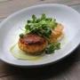 On the Commonwealth menu, a crab cake starter with microgreens, green goddess dressing and grapefruit. 