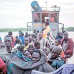 People displaced by fighting in South Sudan have sought safety by piling onto boats like this one on Jan. 9. Over the weekend, an overloaded ferry sank.
