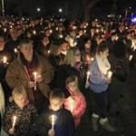 Hundreds of people turned out on Franklin Common for a vigil to remember Lexi Munroe, 8, and Sean Allan Munroe II, 7, who suffocated after they became trapped inside a hope chest in their home Sunday.