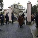 Russian police patrolled the entrance of a church during heightened security for Orthodox Epiphany celebrations in Sochi Sunday. The city will host the Winter Olympics beginning Feb. 7, including an estimated 15,000 US visitors.