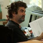 Director Joe Berlinger (left) reviewed documents with ex-FBI agent Robert J. Fitzpatrick for the movie “Whitey.”