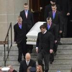 Mourners carried a casket at the funeral of Lexi and Sean Munroe, the Franklin siblings who suffocated in a hope chest.