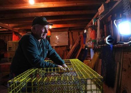 “It could have been bankruptcy, if something major had happened. . . . You can see your whole life and your whole family fall totally apart,” said Arnold Gamage, a lobsterman in Maine. His old monthly premium was $800. It’s now $480.

