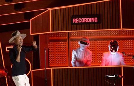 Pharrell Williams and Daft Punk performed onstage during the Grammys. Daft Punk won Album of the Year.
