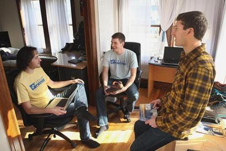 From left, Forsake partners Jack Knoll, Jake Anderson, and Sam Barstow discussed their company in their Allston apartment.
