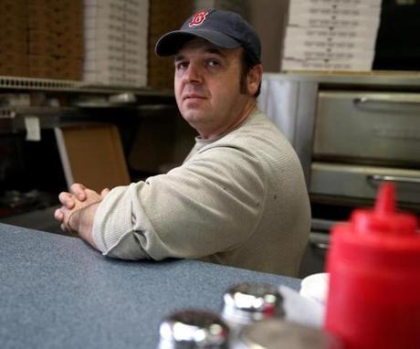 Artan Mertiri, owner of a restaurant near the planned location of a Boston dispensary, expressed concerns.
