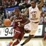 Guard Chaz Williams, driving past Langston Galloway of Saint Joseph’s, provided UMass with 16 points and 10 assists.